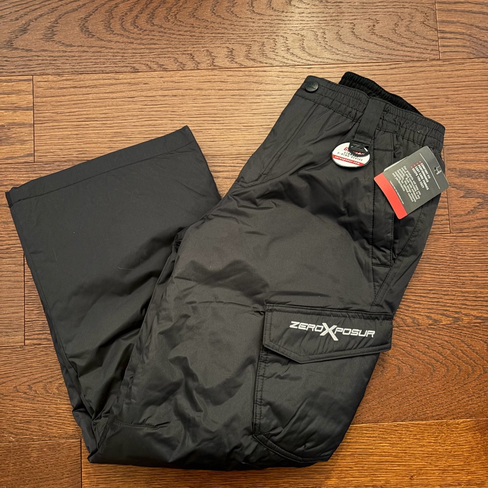 Snow pants new with tags . Kids size L 14-16